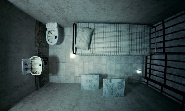 Celda en prisión federal de Estados Unidos para acusados de narcotráfico internacional con cama de concreto y vigilancia estricta