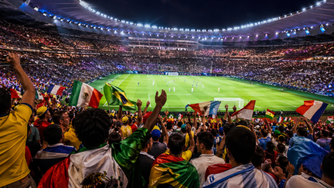 viajar al Mundial 2026 en estadio lleno de aficionados durante partido