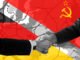 Mapa geopolítico con representantes de Alemania y Rusia estrechando manos por acuerdo nuclear en Lingen