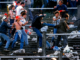 Aficionados violentos conocidos como hooligans se enfrentan en las gradas de un estadio durante un partido de fútbol en Inglaterra.